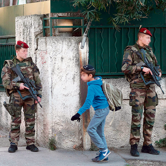 Police officers guard a Jewish school in Marseille (Credit:AFP)