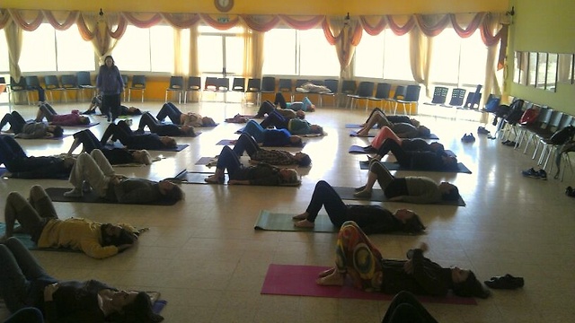 Tree of Life participants taking part in a yoga class. (Photo: Buzzy Gordon)