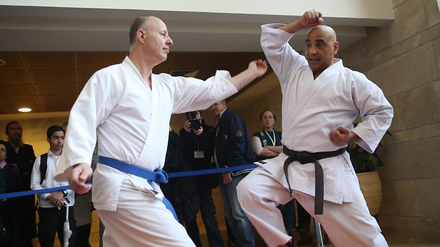 MK Hanegbi takes on MK Amar in karate match (Photo: Knesset Spokesman)
