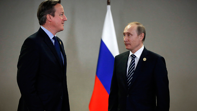 פוטין: "מחפשים איך ללכלך על רוסיה". קמרון: "זה עניין פרטי" (צילום: EPA) (צילום: EPA)