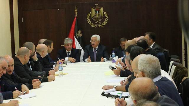 President Abbas with the reporters, Thursday. (Photo: Ofer Meir)