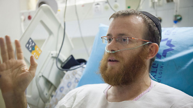 Mendi Rivkin in the hospital after the attack (Photo: Daniel Elior)