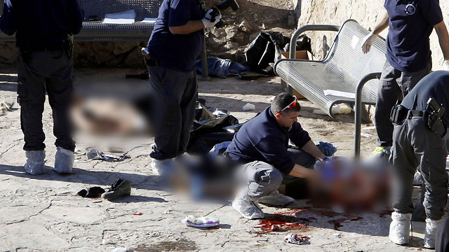 Bodies of the terrorists after the terror attack in the Damascus Gate, Jerusalem (Photo credit: AFP)