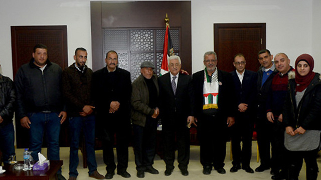 Abbas meets with families of terrorists in Ramallah.