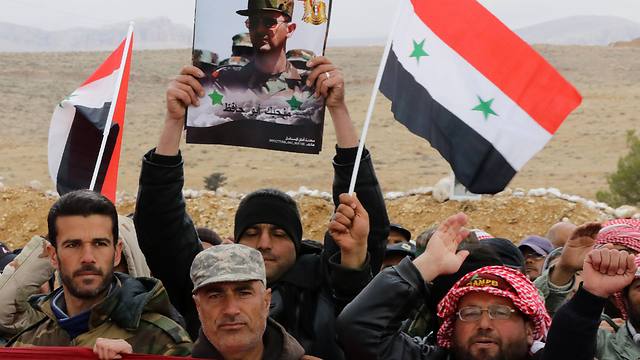 Assad supporters (Photo: AFP)