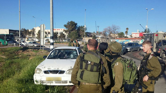 Car used in vehicular attack at Gush Etzion Junction (Photo:  Israel Fire and Rescue Services)
