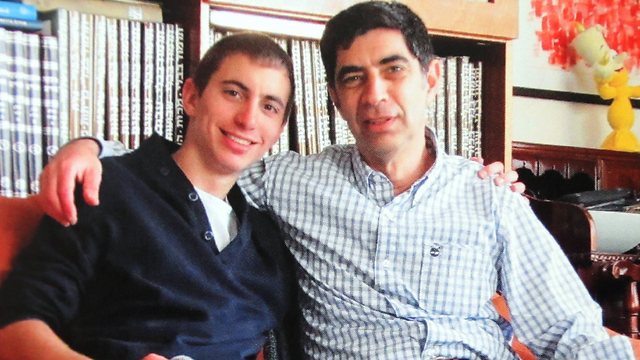 Hadar Goldin with his father, Simcha (Photo: Yariv Katz)