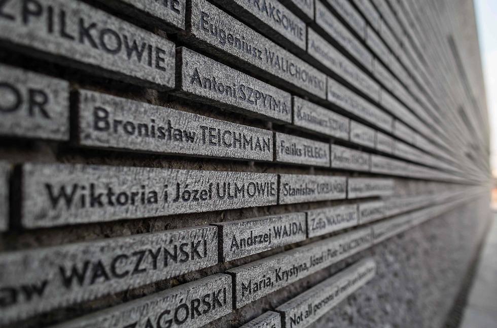 שמותיהם של הפולנים שסייעו ליהודים - ונרצחו ע"י הנאצים (צילום: AFP) (צילום: AFP)