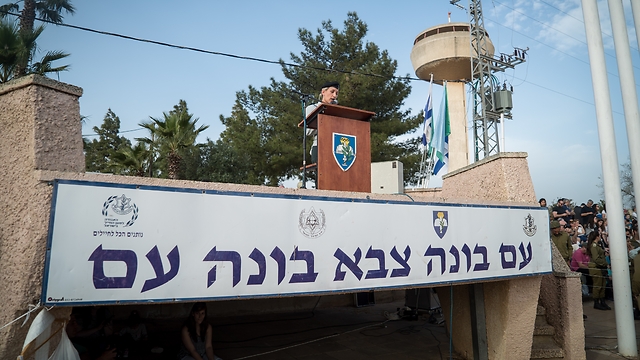 Sign at Mikhve Alon base where many lone soldiers begin service: The nation builds the army which builds the nation (Photo: IDF Spokesperson's Unit)