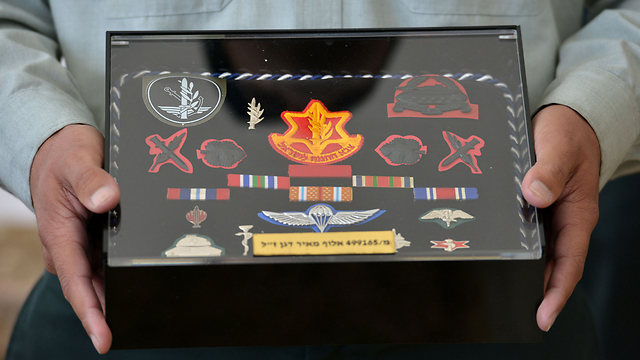 האותות והדרגות של דגן במהלך שרותו הצבאי (צילום: קובי גדעון, לע"מ ) (צילום: קובי גדעון, לע