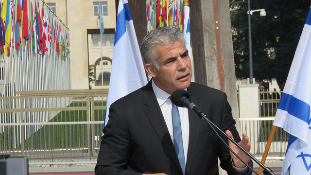 MK Yair Lapid speaking at demonstration in Geneva
