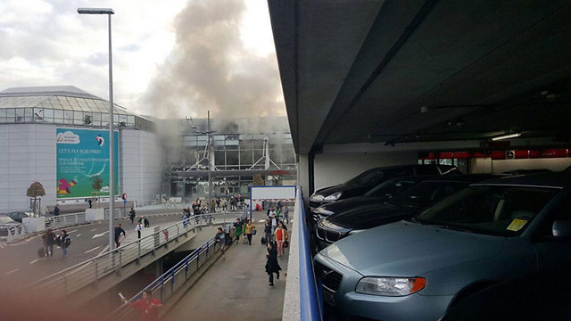Smoke from explosions at Brussels airport