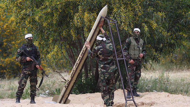 Palestinian terrorists firing rockets at Israel (Photo: AFP/File)