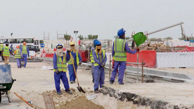 Migrant workers building a world cup stadium in Qatar (Photo: Amnesty International)