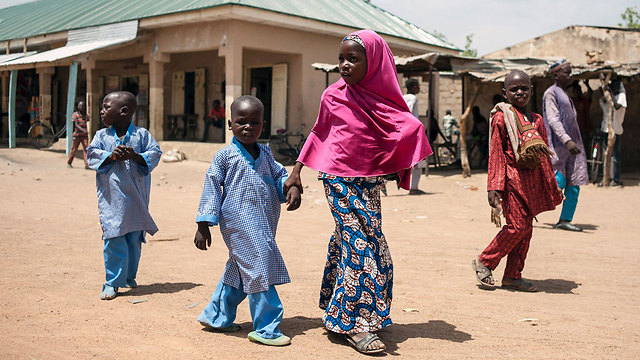 ילדים בצ'יבוק, ניגריה (צילום: AFP) (צילום: AFP)