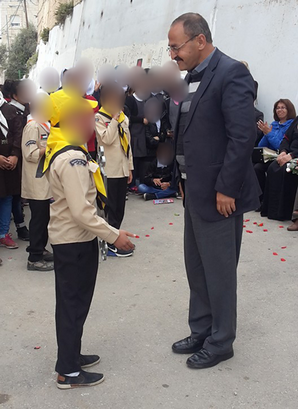 Mohammad Aliyan and a student at the East Jerusalem middle school