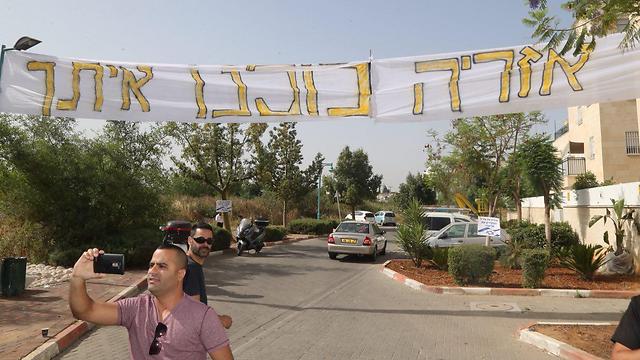 A sign outside Sgt. Elor Azaria's home saying 'Azaria we're all with you' (Photo: Motti Kimchi)