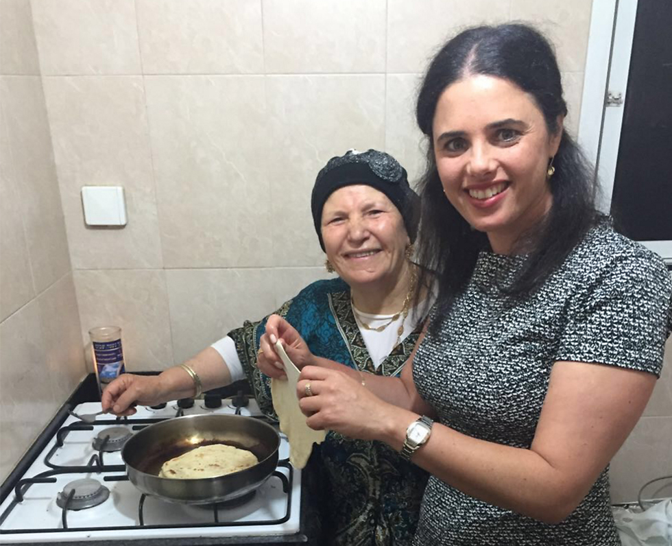 Justice Minister Ayelet Shaked helps make mufletas in Beit She'an.