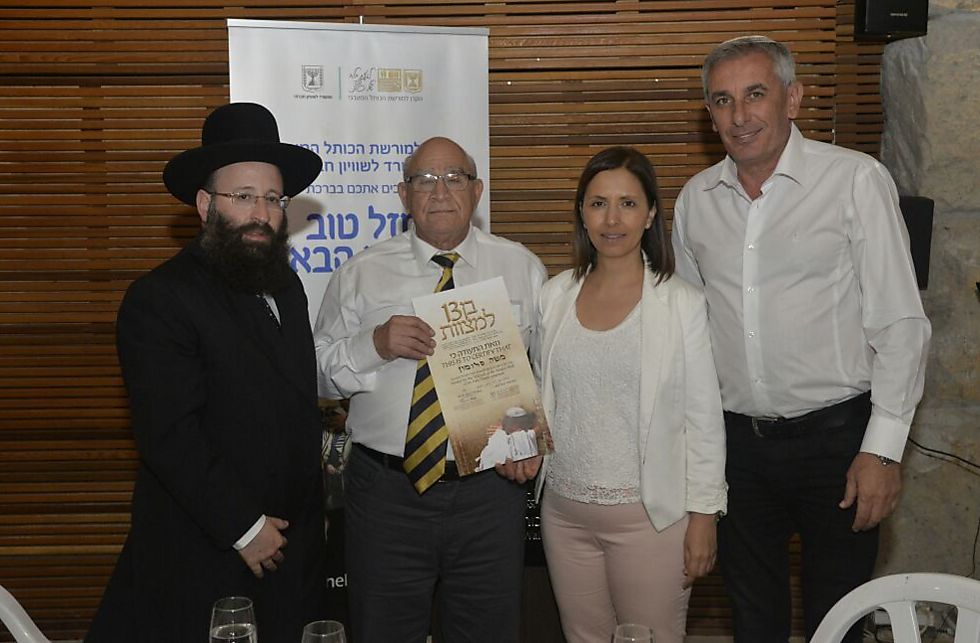 Western Wall Rabbi Rabinovitch, left, with social Equality Minister Gamliel, second on the right.