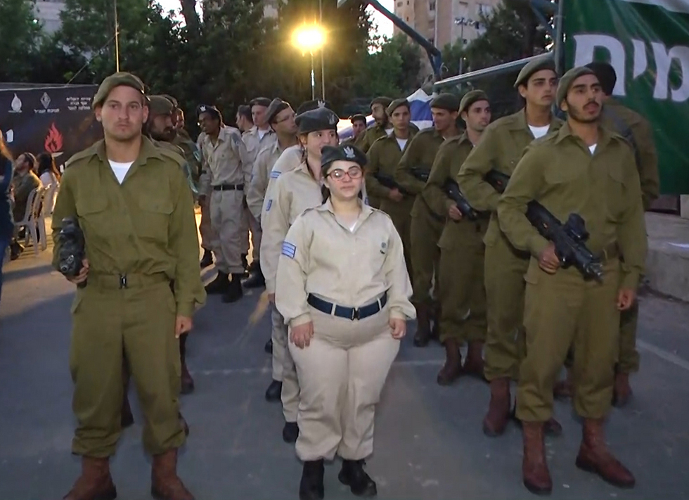 Participants of the 'Special in Uniform' program taking part in the ceremony (Photo: Eli Mandelbaum)