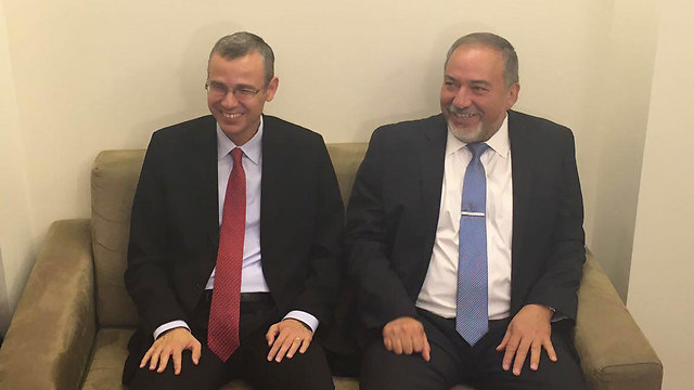 Likud Minister Yariv Levin and Lieberman ahead of their negotiating meeting.