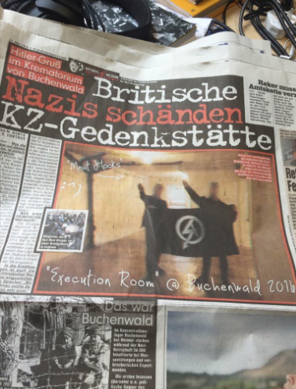 British neo-Nazis perform hitler salute at Buchenwald death camp (Photo: AP)