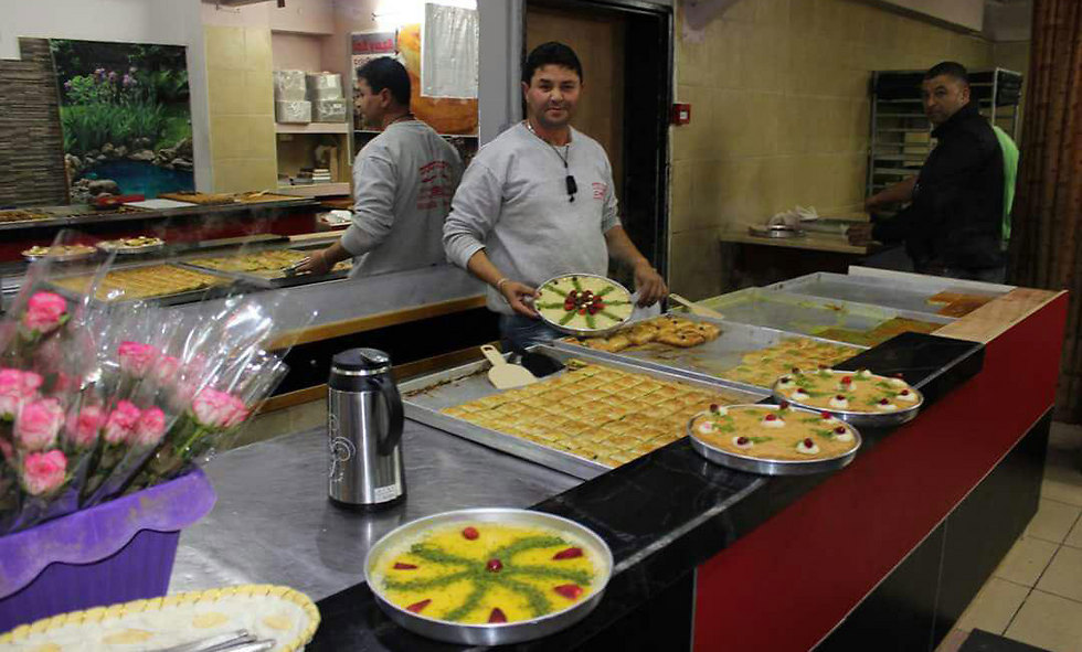 Selling special Ramadan candy in Deir al-Asad, Israel.