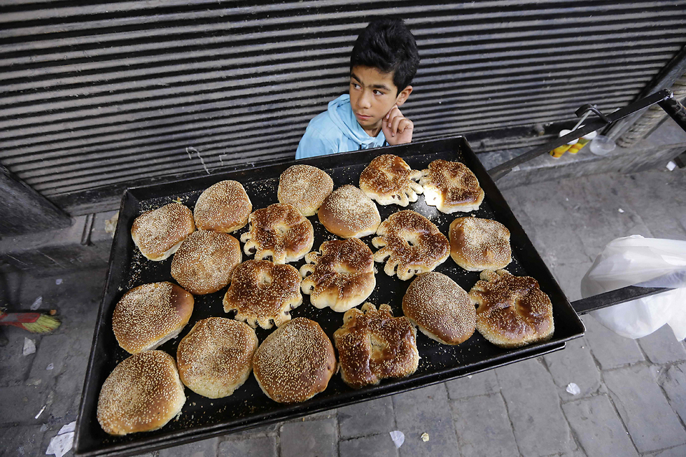 בשוק בדמשק (צילום: AFP) (צילום: AFP)