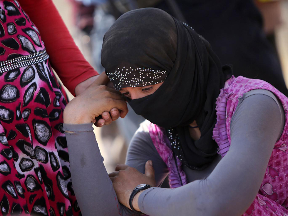 Yazidi women (Photo: AFP)