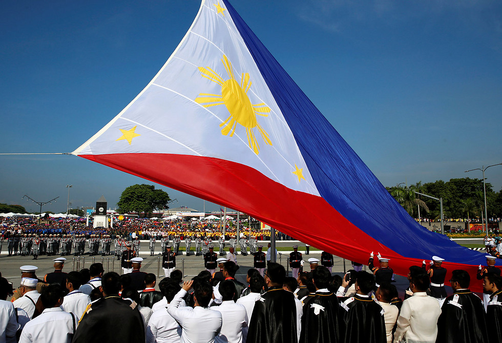 דגל הפיליפינים בעתות שלום (צילום: רויטרס) (צילום: רויטרס)