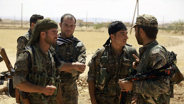 הכוחות הסוריים הדמוקרטיים במנביג' (צילום: AFP) (צילום: AFP)
