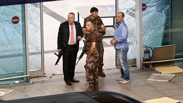 Security forces at the airport after the attack (Photo: EPA)