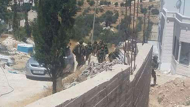 IDF forces at the terrorist family's home