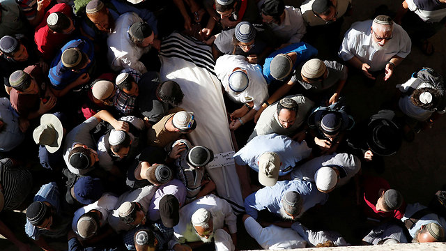 Miki Mark's funeral (Photo: Reuters)