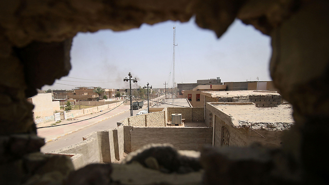 ההריסות בפלוג'ה. דאעש הובס גם שם (צילום: AFP) (צילום: AFP)