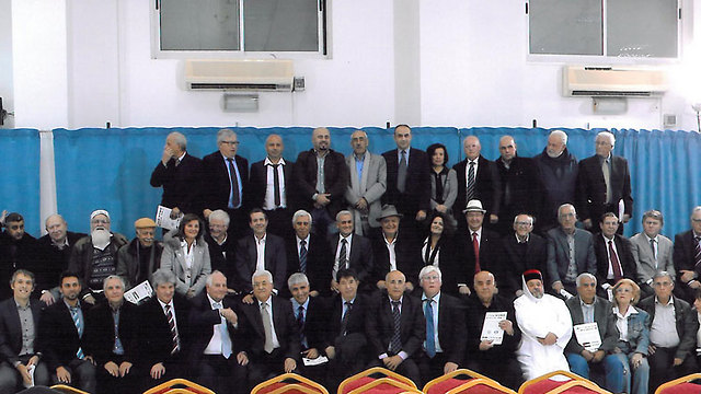 The group in a previous meeting with Abbas