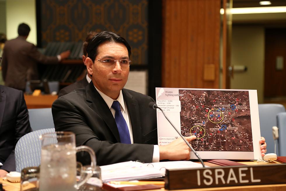 Ambassador Danny Dannon with a photo of Hezbollah infrastructure at the UN