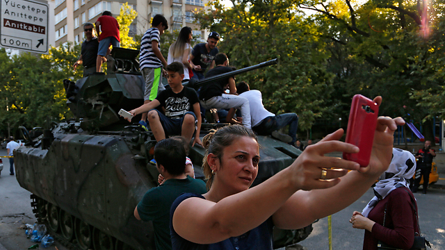 Turkish citizens celebrate the coup's undoing (Photo: AP)