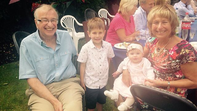 Sharon with her husband Stephen and their two grandchildren (Photo courtesy of the family)