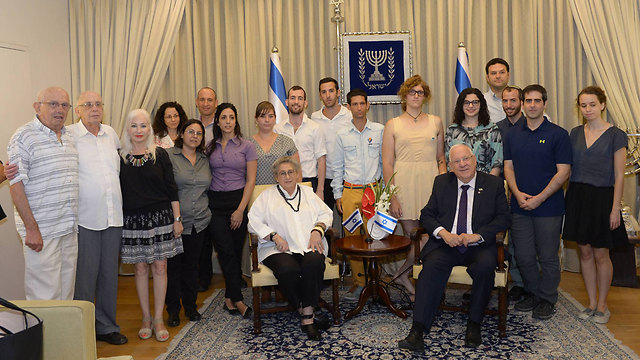 The Rivlins with the JOH representatives and the Bankis (Photo: Amos Ben Gershom/GPO)