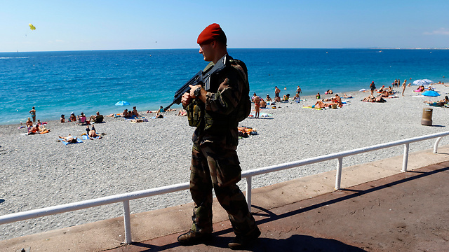 A soldier patrols the boardwalk in Nice (Photo: AP)