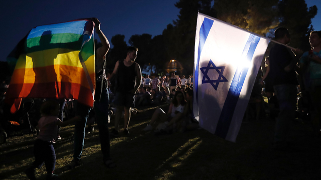 אמש בגן העצמאות בירושלים, לאחר המצעד הגדול (צילום: AFP) (צילום: AFP)