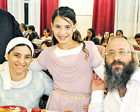 Tehila with her parents Michael and Chava