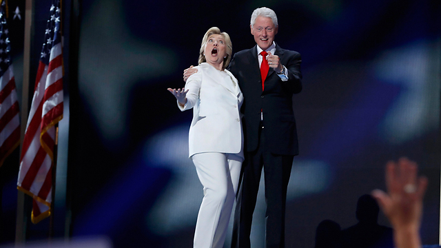 Hillary Clinton and her husband Bill Clinton at the Democratic National Convention (Photo: Reuters)