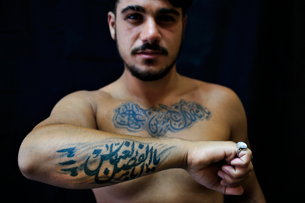 Hezbollah supporters tattoo Nasrallahs face on their chest