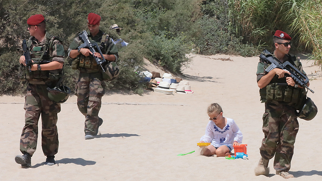 French soldiers patrol beaches (Photo: MCT) (Photo: MCT)