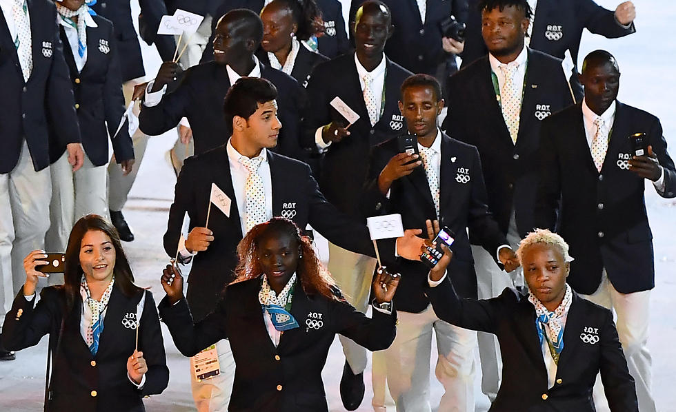 מסוריה ועד קונגו. 10 הספורטאים של משלחת הפליטים (צילום: AFP) (צילום: AFP)