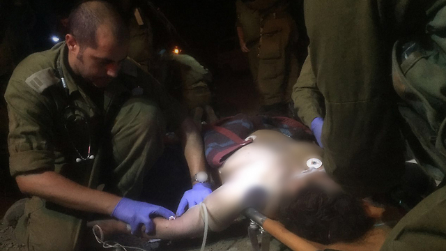 Wounded Syrians being evacuated from the border to Israeli hospitals (Photo: IDF Spokesperson's Unit)