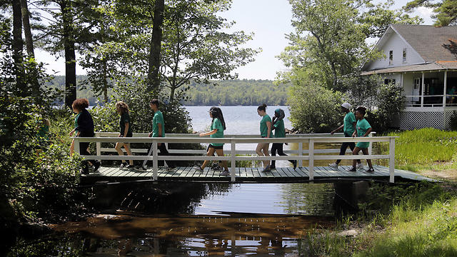 Teens walk to the next activity after lunch at the Seeds of Peace camp. (Photo: AP)
