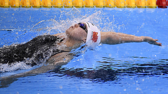 כוכבת סינית, אף שזכתה רק במדליית ארד (צילום: AFP) (צילום: AFP)